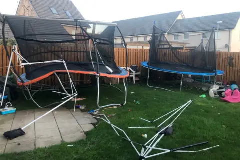 Two trampolines in a garden