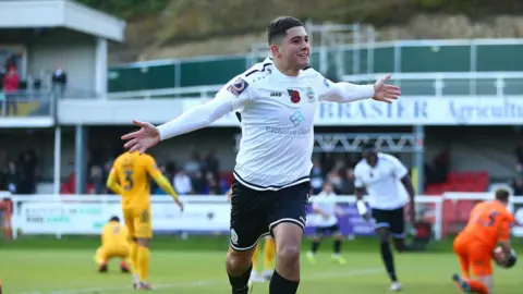 Jordan Mansfield Ruel Sotiriou of Dover Athletic celebrates after scoring