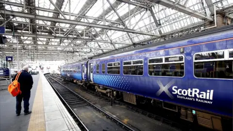 PA Media ScotRail train in station