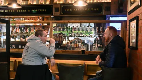 Pacemaker Two men drinking beer