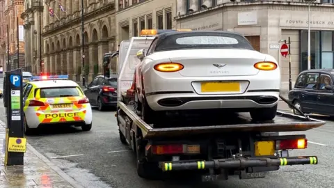 GMP Car towed away
