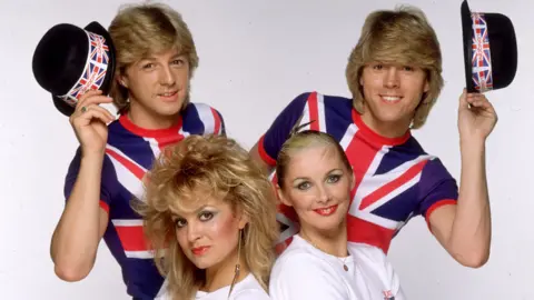 Getty Images (Clockwise L-R) Bobby G, Mike Nolan, Cheryl Baker and Jay Aston of Bucks Fizz in 1981