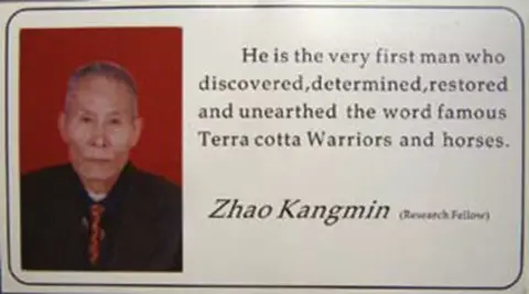 John Man Zhao Kangmin's business card, which reads: "He is the very fist man who discovered, determined, restored and unearthed the world famous Terracotta Warriors and horses."