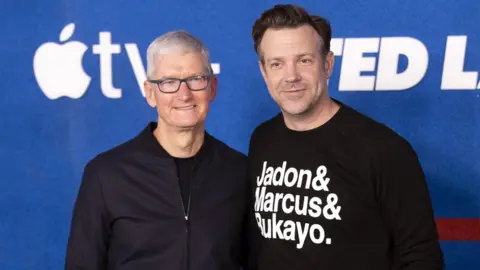 EPA Tim Cook and Jason Sudeikis