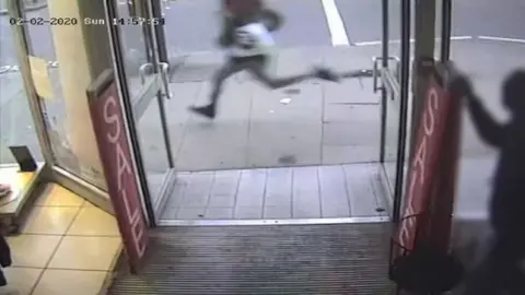 Met Police CCTV of Amman running