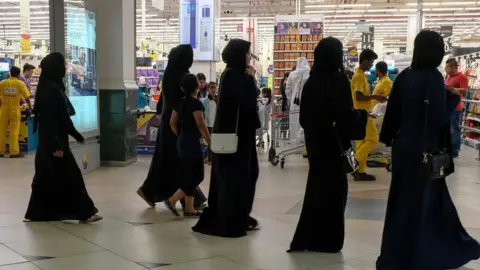 EPA Women at a supermarket in Doha, Qatar, 6 June 2017