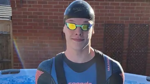 Family photo Matt Richards training at home