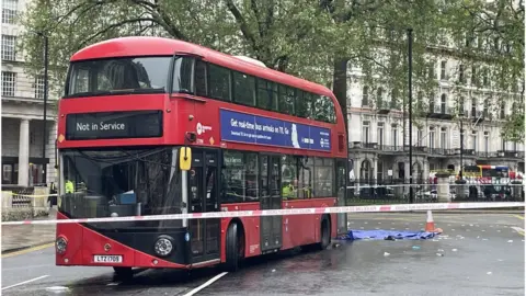 BBC A double-decker bus at the scene