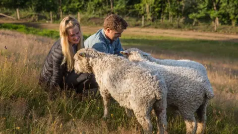 Dartmoor Shepherd Lewis and Flora with some of their sheep