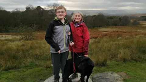 Anne James and his mother Anne with their dog