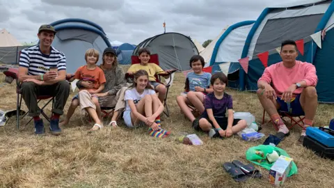 (left to right) Adrian Kerr, Aristide, Philippa Barr, Sofia (sitting), Milo (yellow T), Xan, Caspar and James Wong