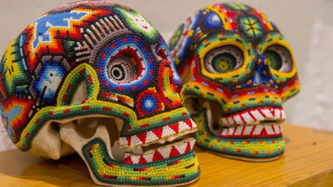 Getty Images Skulls decorated with beads