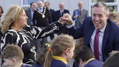 Paul Givan Taking part in a cèilidh during the visit