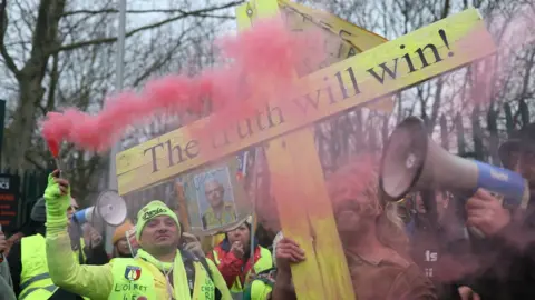 PA Media Julian Assange supporters outside court