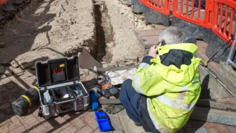Getty Images A stock photo of broadband installation