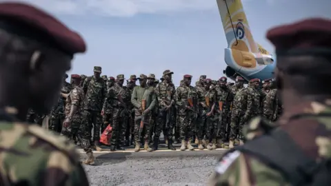 AFP Kenyan soldiers from the East African Community regional force (EAC-RF) prepare to leave the Democratic Republic of Congo, at Goma airport, on December 3, 2023.