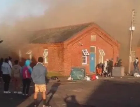 Care4Calais A fire broke out at the barracks earlier this year