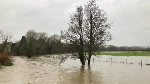 The River Cynin bursts its banks at St Clears