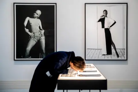 Alamy Shots by Isaac Sutton (left) and Moneta Sleet in the Black Image Corporation