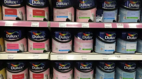Reuters Dulux paint tins