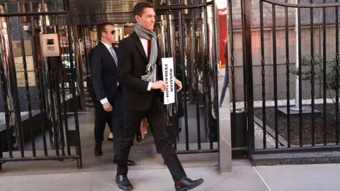 Getty Images People exit the Permanent Russian Mission to the United Nations on March 26, 2018 in New York City