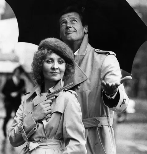Getty Images Roger Moore and Lulu