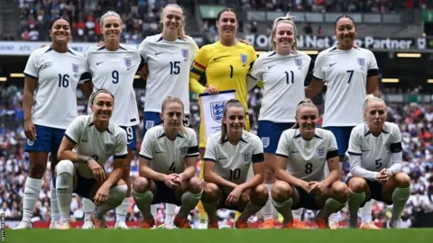 Getty Images England players lining up before the draw with Portugal in their final warm-up match