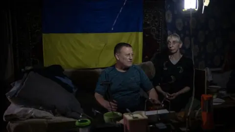 Getty Images Civilians shelter in basements in Avdiivka