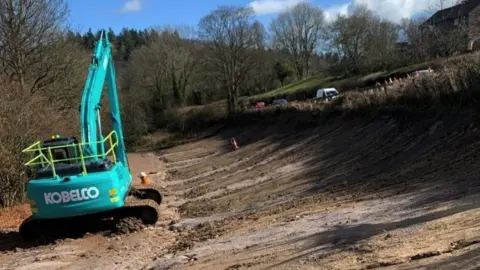 National Highways Digger working on the A40 reconstruction