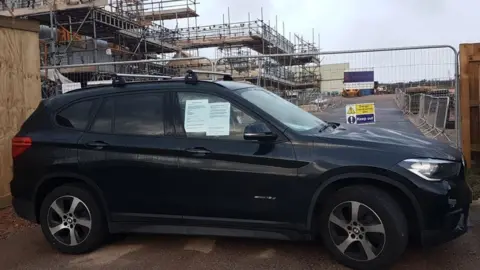 MICHELLE HOUGH car blocking drive