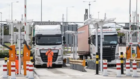 Getty Images Trucks at a customs post