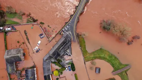 An aerial view of the Welsh village of Crickhowell which has been cut off after the river Usk bursts its banks. February 16, 2020