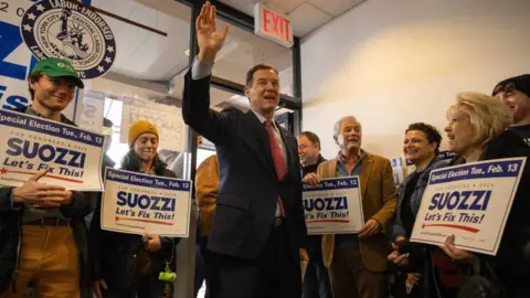 Getty Images Tom Suozzi and supporters
