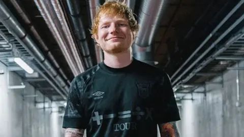 Ipswich Town Football Club Ed Sheeran in Ipswich Town blackout kit