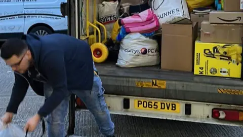 Kinga Orkisz  Lorry full of donations at Boucher Road collection centre