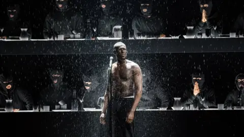 Getty Images Stormzy on stage at the Brits