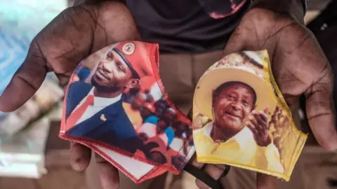 AFP Face masks with images of Bobi Wine and Yoweri Museveni