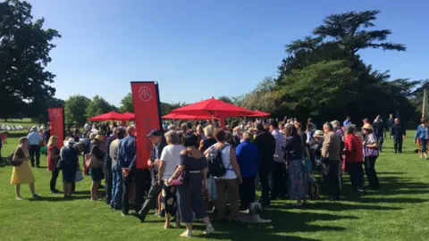 Crowds gather around the tables where experts use their experience to surprise or disappoint the public.