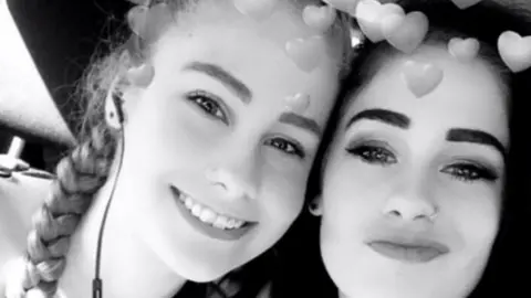 Family handout Chris left, Sam right