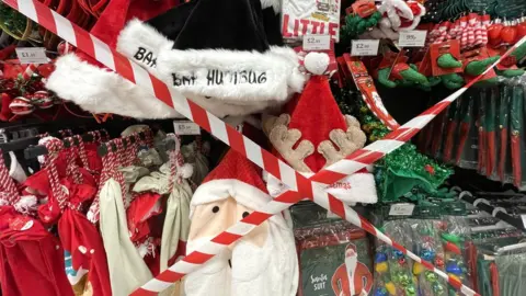 Getty Images Christmas decorations taped off in Home Bargains in Cardiff Bay