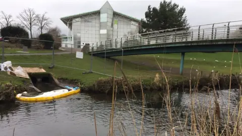 BBC The culvert runs into the river in the town's park