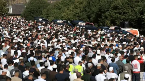 PA Mourners gather in Bradford for the funerals of Murtza Chaudhry, Arbaaz Hussain, Zeeshan Khalid and Tayyab Siddique