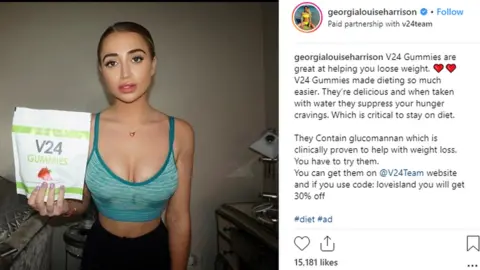 Instagram Georgia Harrison holding up a bag of V24 gummies