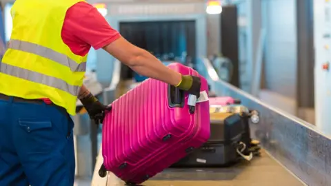 Getty Images Baggage handler image