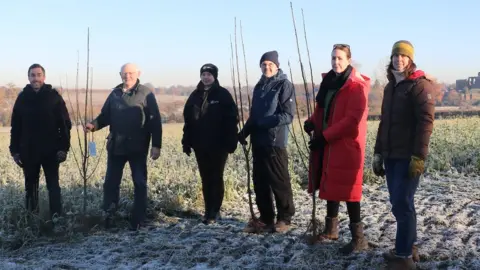 Warwick District Council Councillors planting trees in Warwickshire