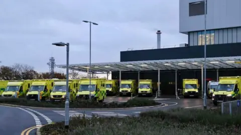 Getty Images Ambulances parked outside Accident and Emergency unit at The Grange Hospital