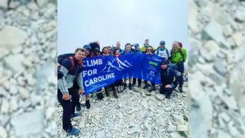 olly Murs The Climb For Caroline team at the top of a peak