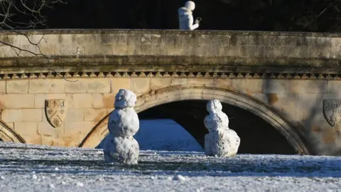 PA Snowmen on the banks of the River Cam in Cambridge