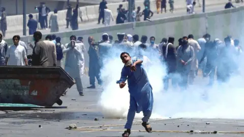 Reuters Thousands of Imran Khan supporters took to the streets following the brief arrest of the former Pakistani prime minister on 9 May