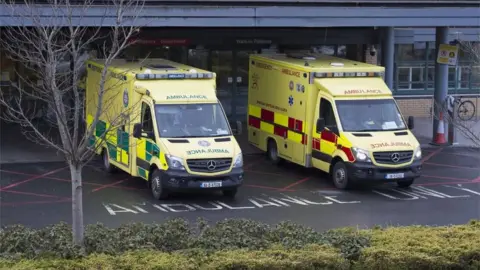 EPA Emergency ambulances pictured at an Accident and Emergency Department of a Dublin City Hospital, in Dublin, Ireland, 12 January 2021. Ireland is currently witnessing a enormous surge of COVID-19 cases after the Christmas season. EPA/STR